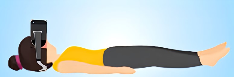This image illustrates the recommended meditation posture when using Strobonaut in a headset. A woman lying in the savasana meditation posture with a headset on.